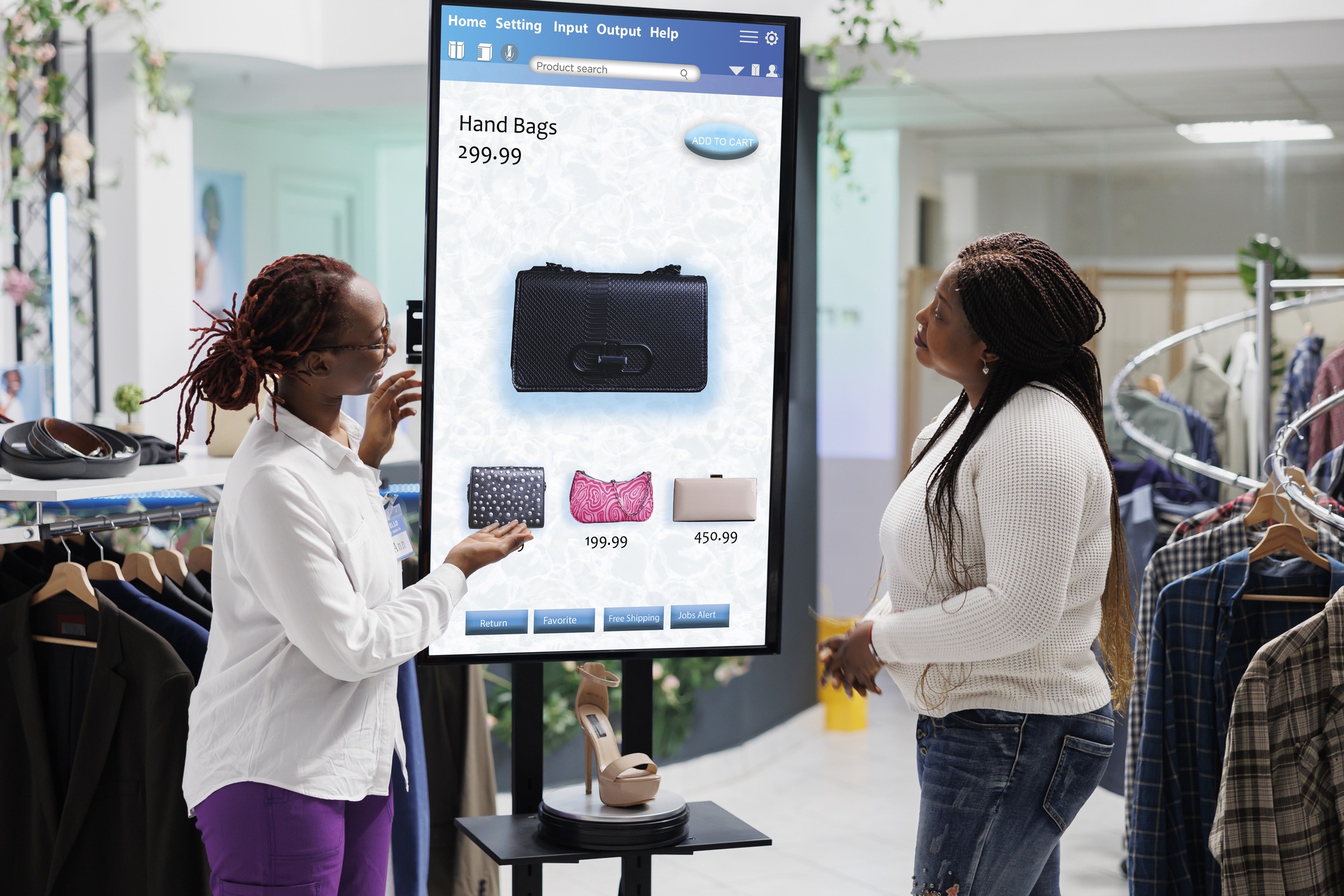 Two women chatting about a product displayed on a digital signage display screen inside a shopping store